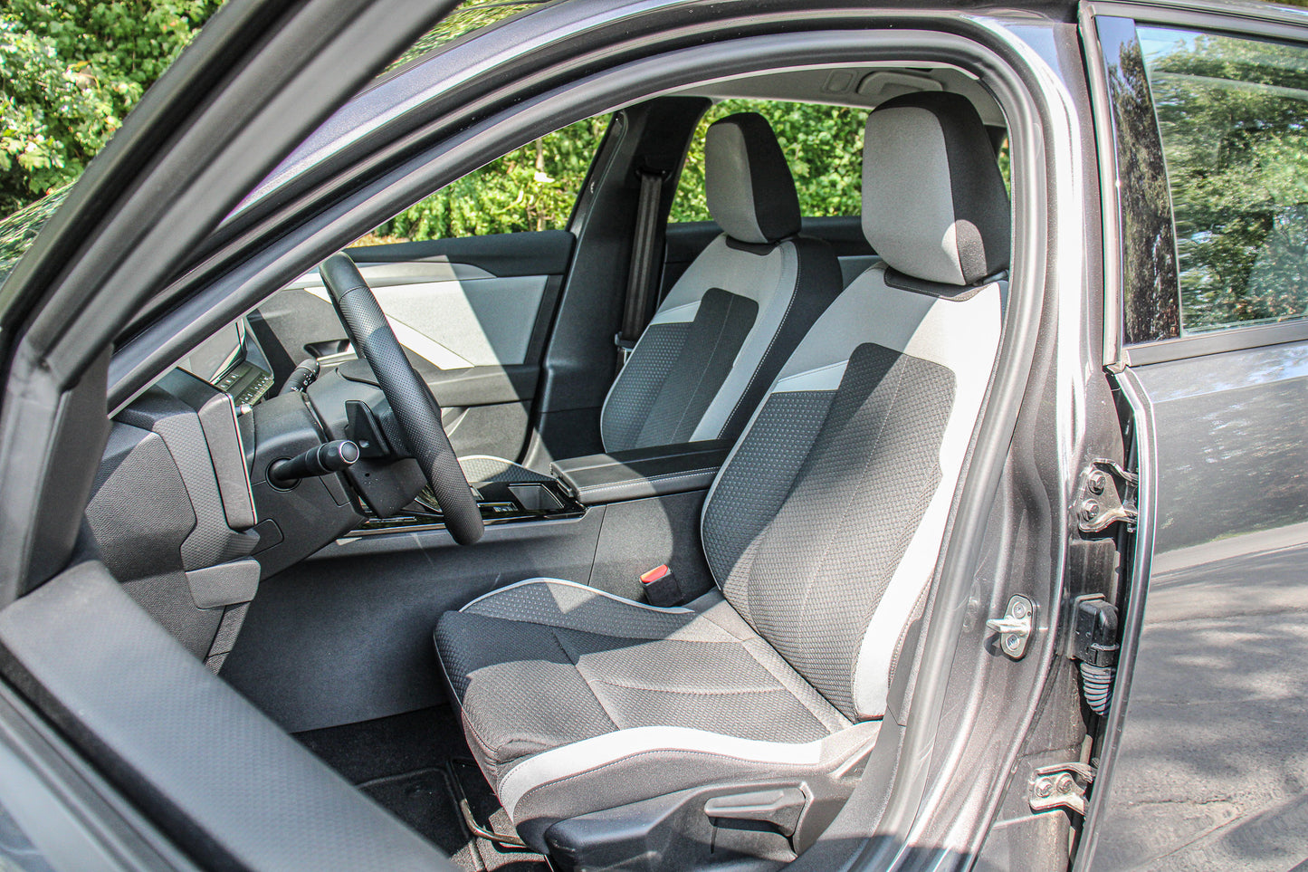 Opel Astra // 15.609 km - Benzine/hybride - 2023